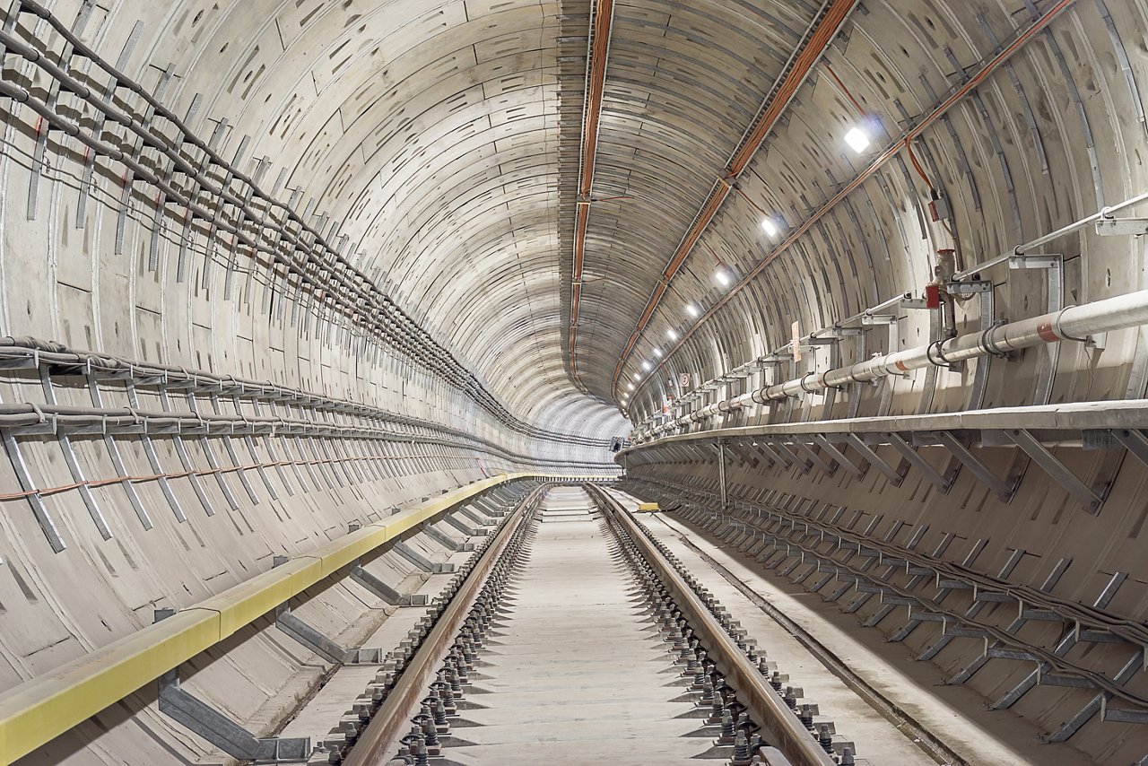 Railway underground tunnel which install running and conductor rail. Selective focus.; Shutterstock ID 1723933543; purchase_order: CON; job: M&C main application areas; client: ; other: 