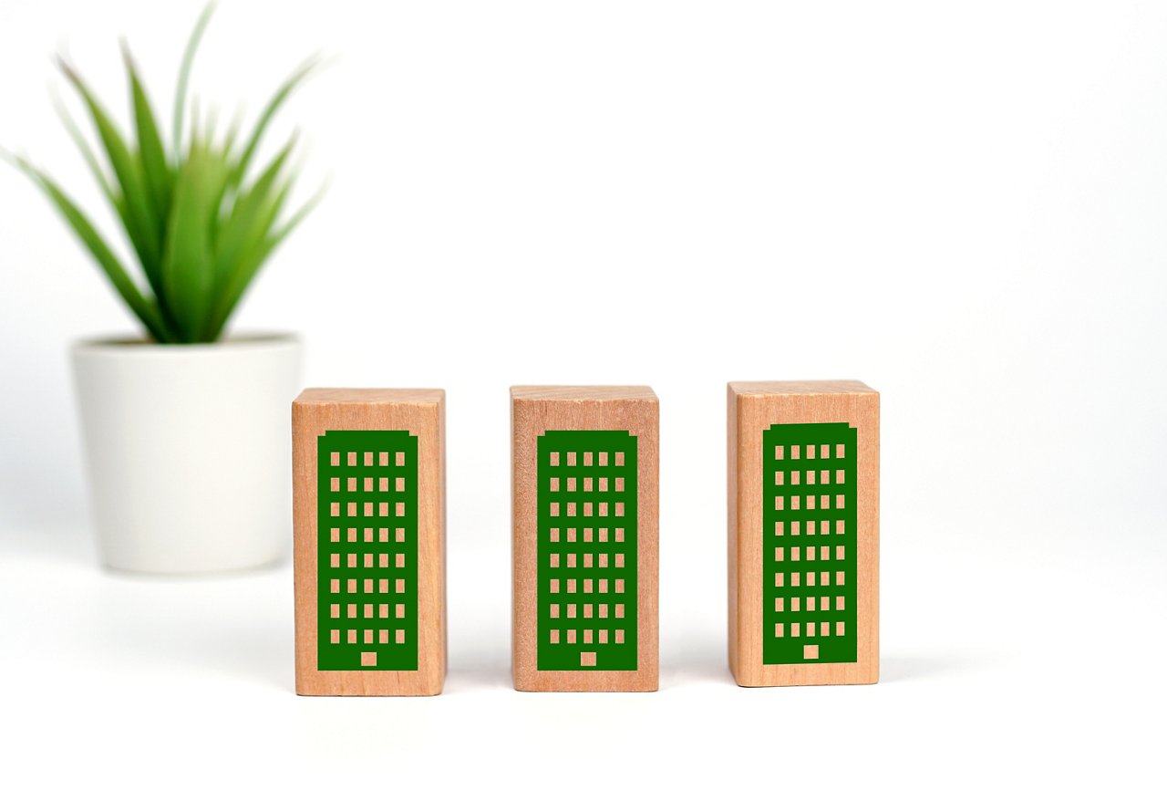 Green and eco building concept. wooden cubes with green building symbols. LEED certification. Leadership in Energy and Environmental Design. Sustainable.            ; Shutterstock ID 2266319965; purchase_order: CON; job: ; client: ; other: 