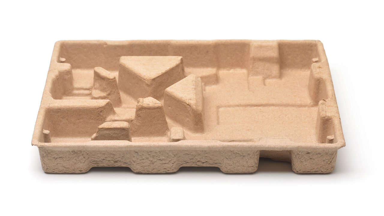 Empty molded pulp protective packaging tray