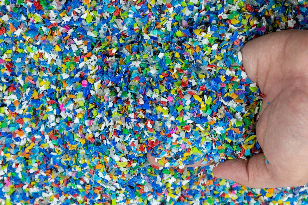 Close-up of plastic polymer granules. hand hold Polymer pellets. polymer plastic. compound polymer.; Shutterstock ID 1673297089; purchase_order: POL_website_Recycling; job: ; client: ; other: 