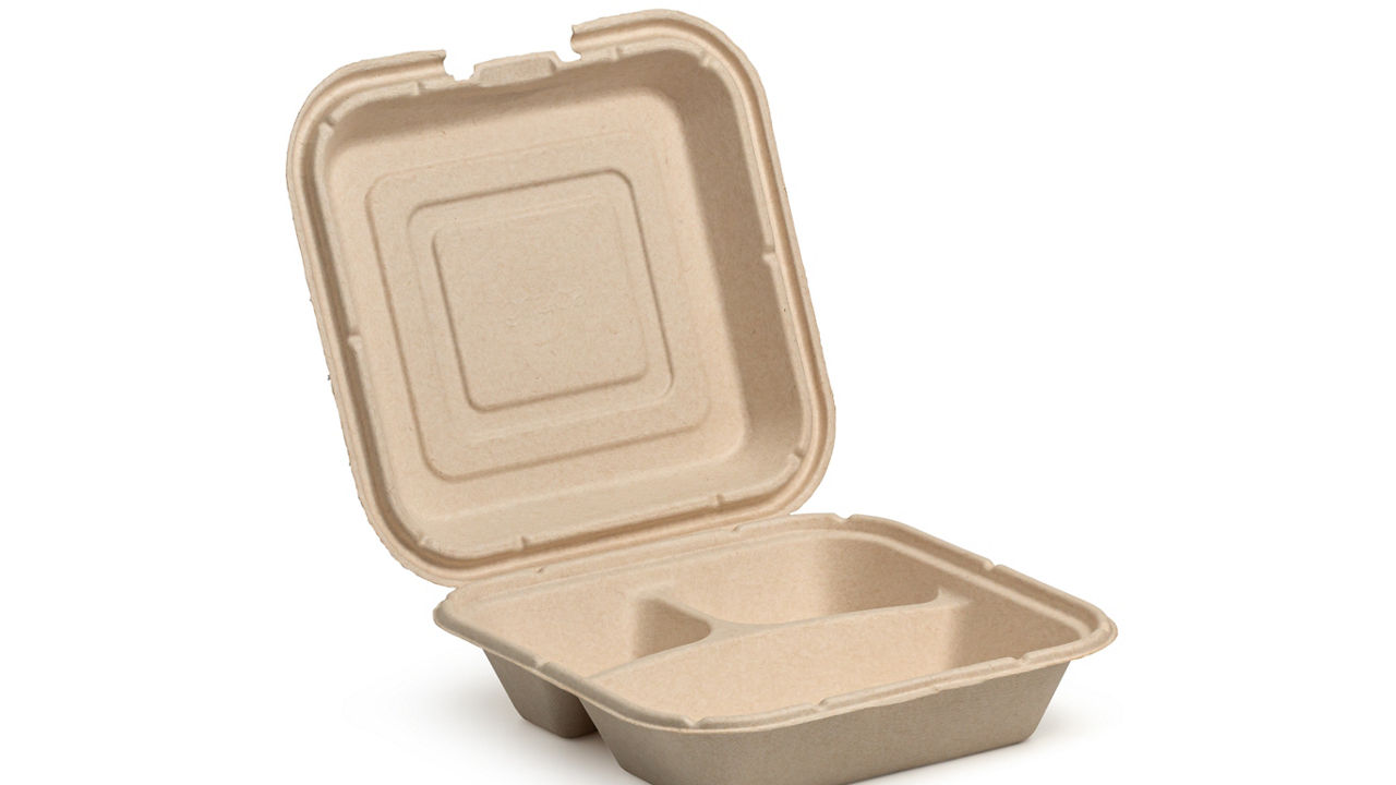 Molded pulp or fiber clamshell takeout container made of eco-friendly, biodegradable material and has a hinged design that allows to open or close to contain food items, isolated on a white background; Shutterstock ID 2453939413; purchase_order: PAB; job: PAB; client: PAB; other: 