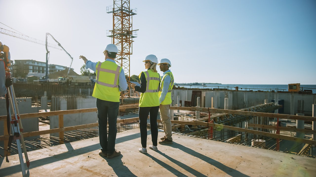 Diverse Team of Specialists Are on Construction Site. Real Estate Building Project with Civil Engineer, Architect, Business Finance Investor Discussing Planning and Development Details.