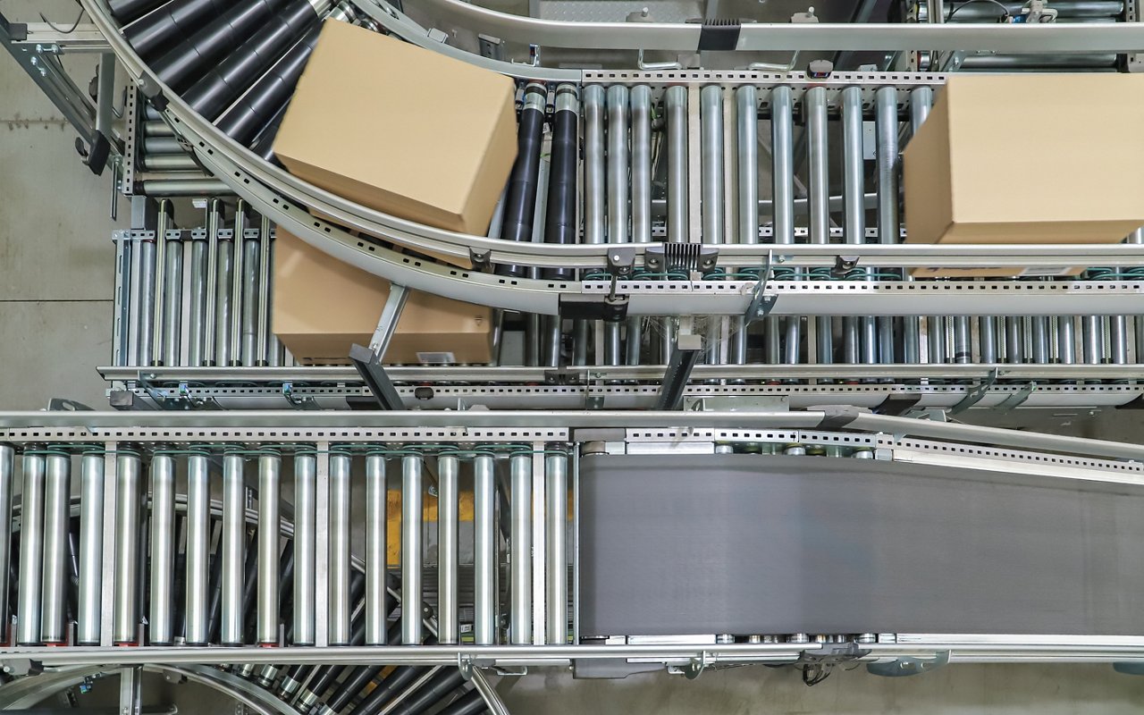 packing line in a logistics warehouse. conveyor belt in a modern