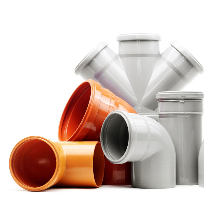 New gray and brown drain pipes isolated over white