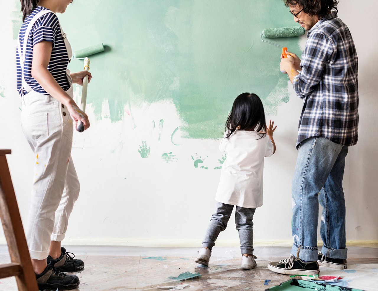 Asian family renovating the house