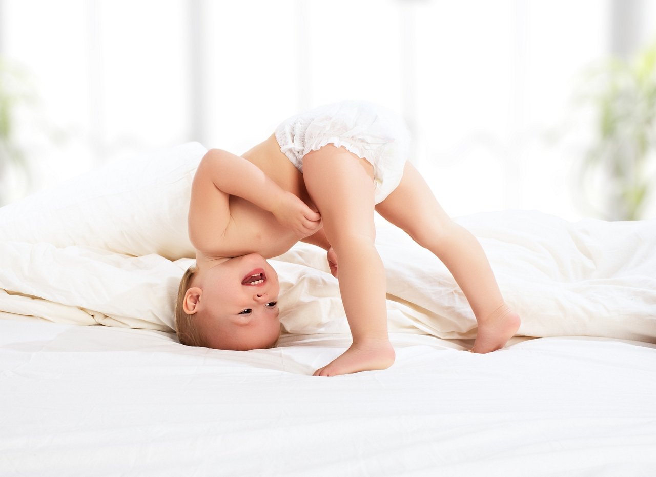 happy baby child play fun in bed; Shutterstock ID 165419738; purchase_order: Polymers Website_Omyafiber; job: ; client: ; other:
165419738