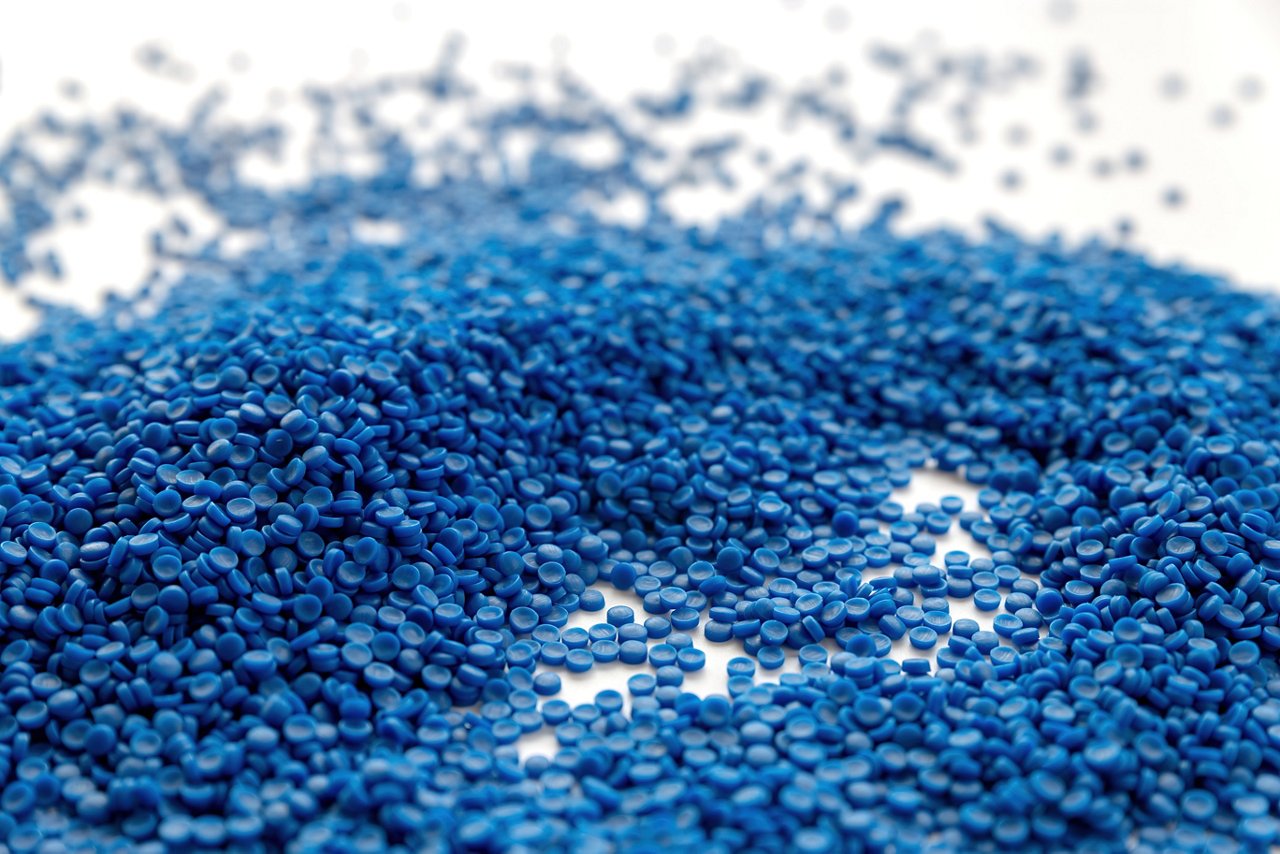 Blue plastic grain, plastic polymer granules,hand hold Polymer pellets, Raw materials for making water pipes, Plastics from petrochemicals and compound extrusion, resin from plant polyethylene.; Shutterstock ID 1809481195; purchase_order: -; job: -; client: -; other: -