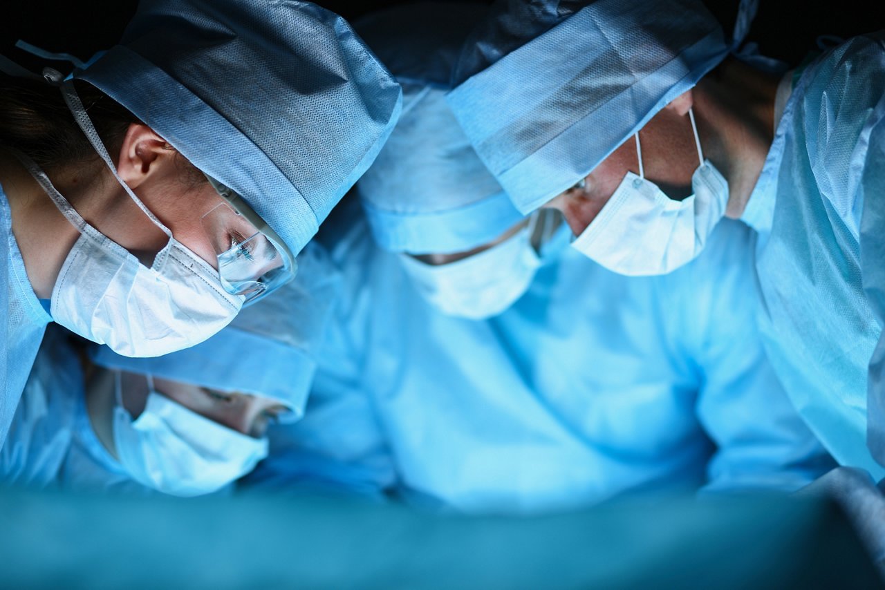 Young surgery team in the operating room; Shutterstock ID 299782112