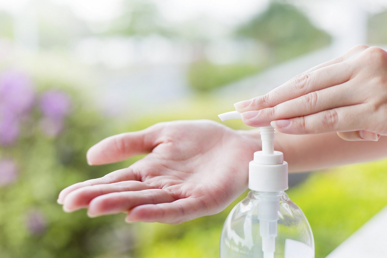 Female hands using wash hand sanitizer gel pump dispenser.; Shutterstock ID 258004772; purchase_order: OPP Website & Media; job: ; client: ; other: 